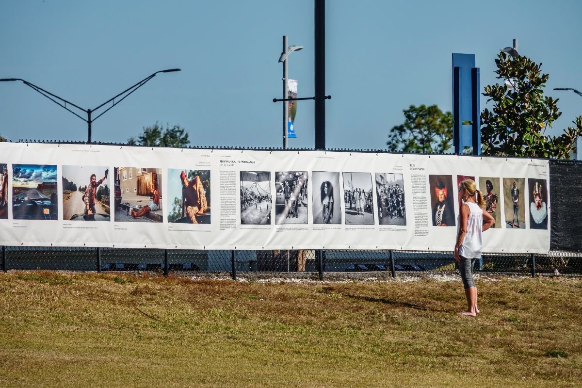 Comparison showing the different textures of mesh and vinyl banners. Mesh vs vinyl banners side-by-node