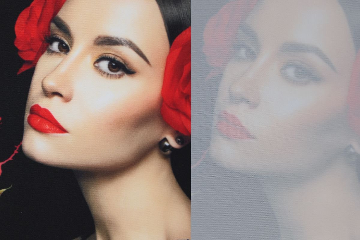 A high-resolution backlit fabric display showcasing vivid colors and even illumination. A large, illuminated backlit fabric display at an event