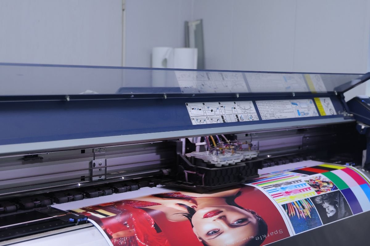 Close-up of a vinyl graphic on a surface under test conditions, showing resistance