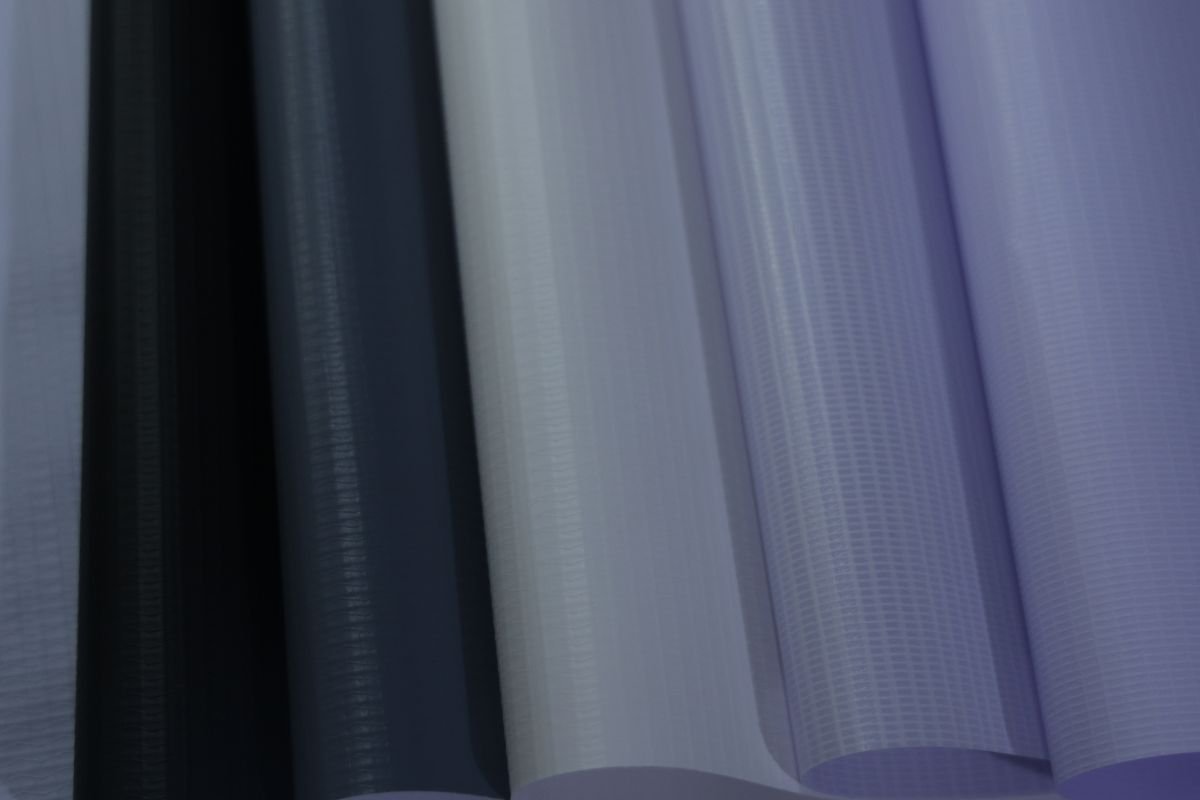 A diagram showing the layers within a banner material. Cross-section diagram of a typical banner material